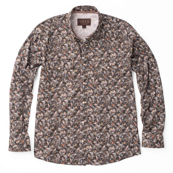 Men's button down shirt with pearl snaps, double breast pockets and duck print all over