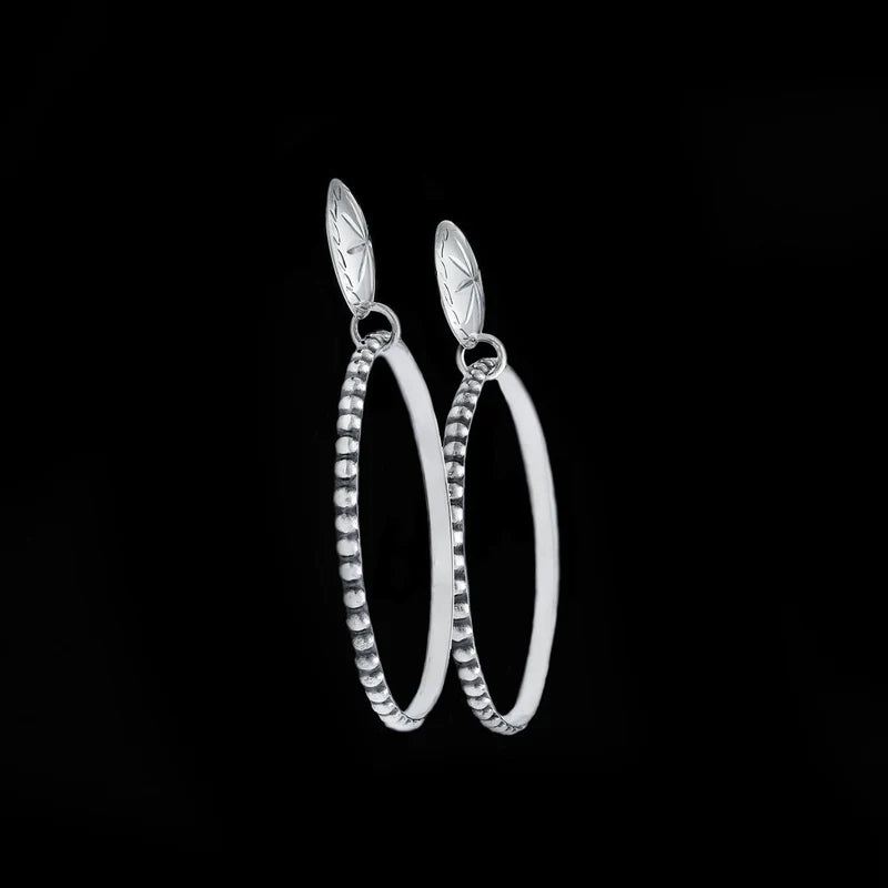 Sterling silver hoop earrings with concho posts