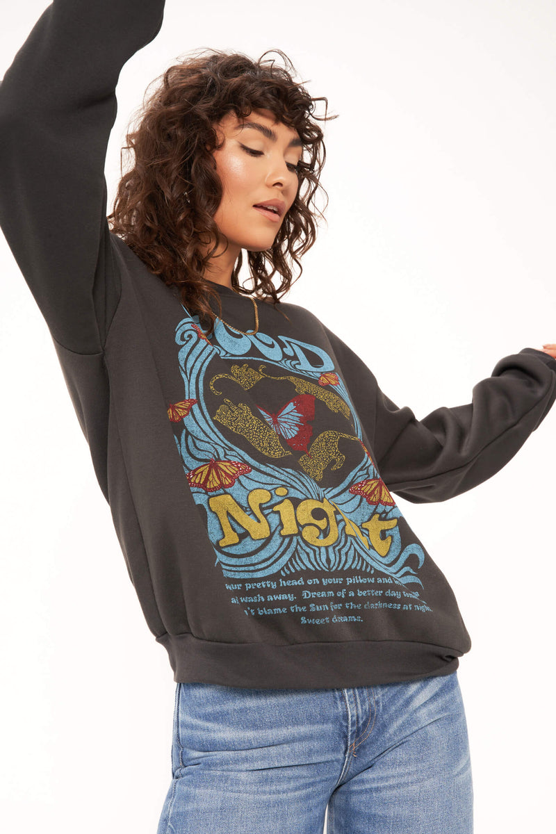 Woman wearing The Good Night Dream Relaxed Sweatshirt featuring a soft fleece fabric and an overall relaxed fit that's so comfy you'll want to wear this every day.
