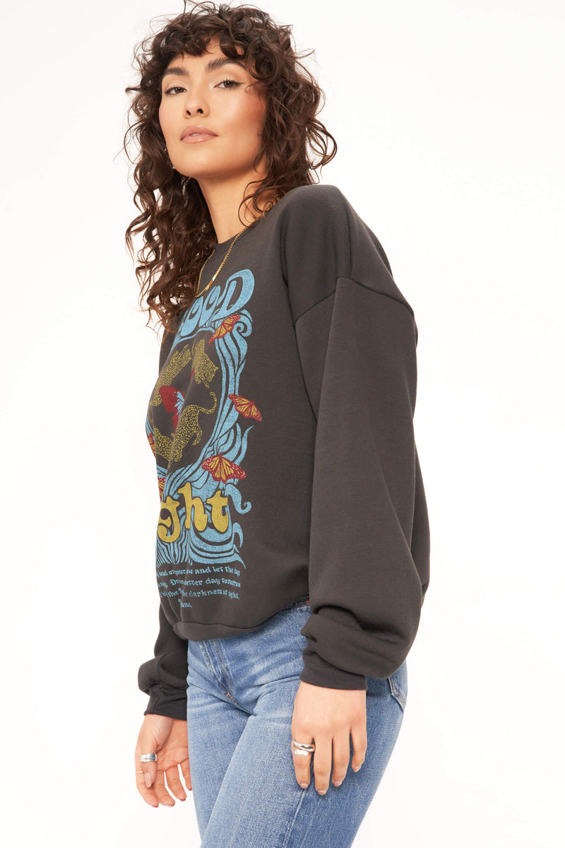 Woman wearing The Good Night Dream Relaxed Sweatshirt featuring a soft fleece fabric and an overall relaxed fit that's so comfy you'll want to wear this every day.