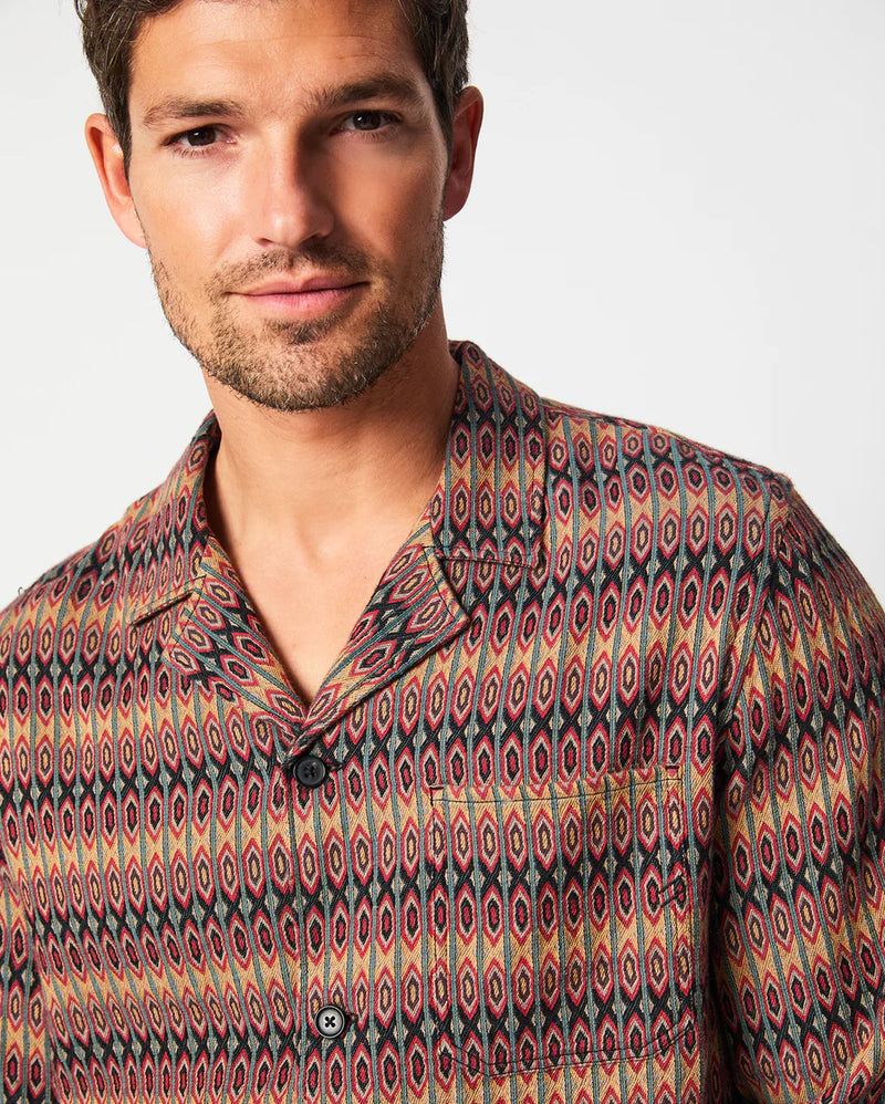 Men's shirt with signature notch pocket with double-needle stitching, a straight hem, and genuine horn buttons in a multi color pattern