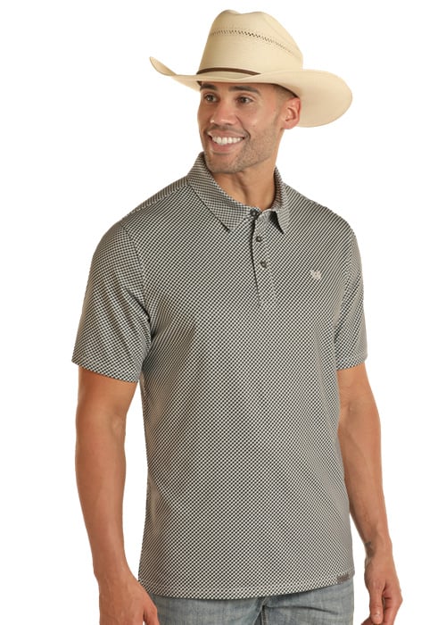 Man wearing short sleeve polo with geometric design