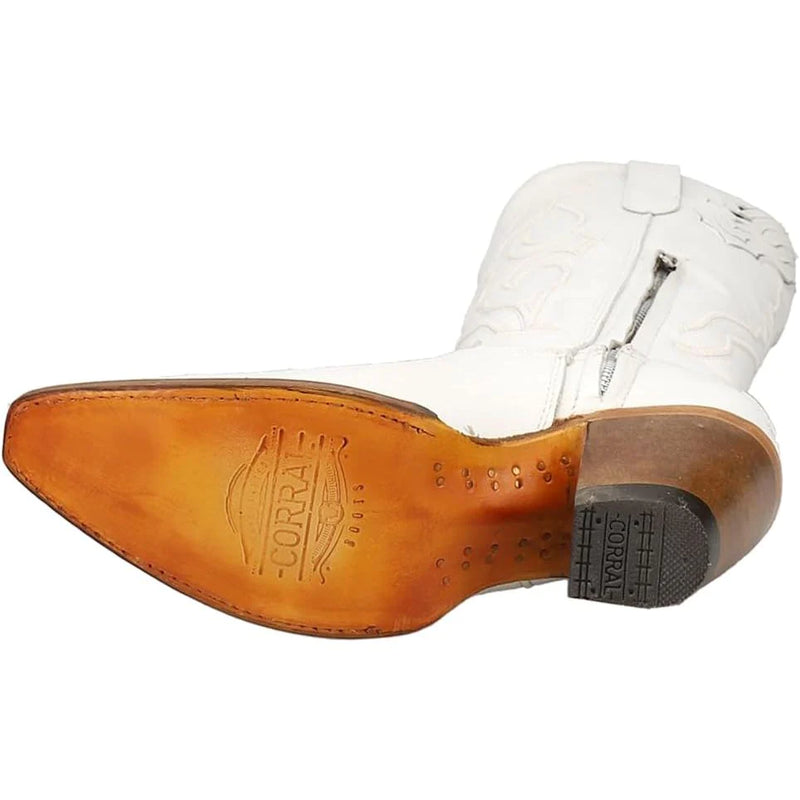 Women's white cowboy boot in 15 inch shaft and zippers on the insides and cording stitching on shaft