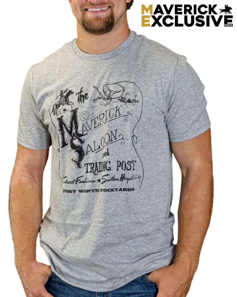 MAVERICK SALOON TEE Grey with black print worn by a man printed with "The Maverick Saloon and trading post . Southwest Fashion and Southern Hospitality at Worth Stockyards"