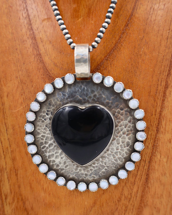 RICHARD SCHMIDT MOTHER OF PEARL AND ONYX HEART PENDANT