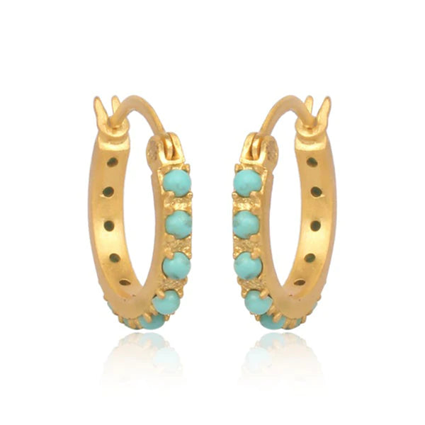tiny gold hoops with turquoise dots all over