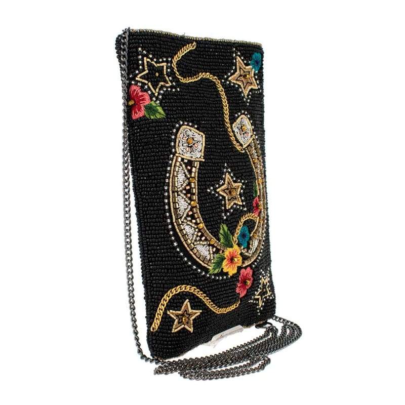 Beaded purse with horseshoe on the front and embellished with stars and flowers.